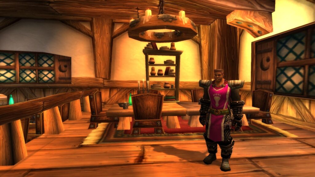 A warm tavern hall with long tables